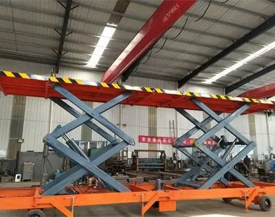 剪(jian)叉式裝卸(xie)貨升降平(ping)台