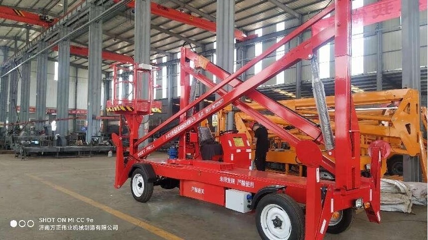 柴(chai)油曲臂式(shi)升降機1